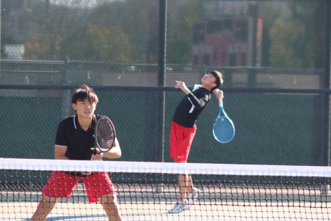 Kobe Nguyen (12) and Christopher Long (12) in action during match