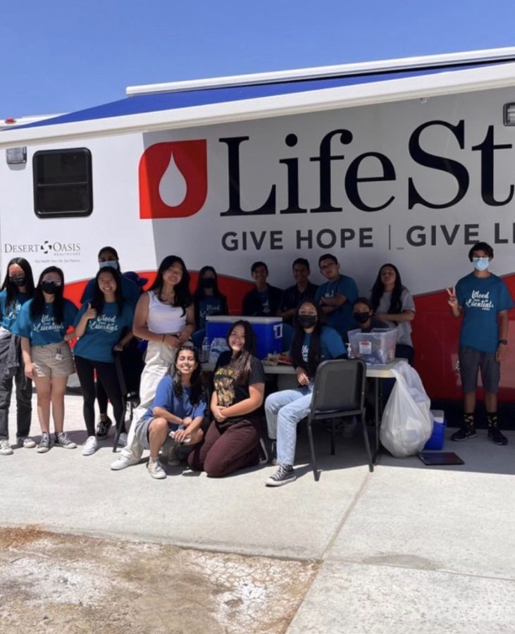 Spanish+Club+and+Red+Cross+Club+gather+in+front+of+LifeStream+donation+truck.