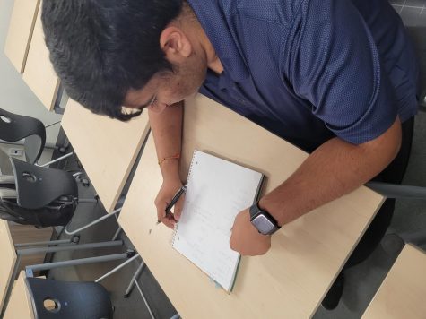 AP calculus AB student Akshar Thakker (11) studies derivatives. “You might understand what youre doing. But as soon as you try to explain it, the words dont come out,” Mr. Sjol said.  
