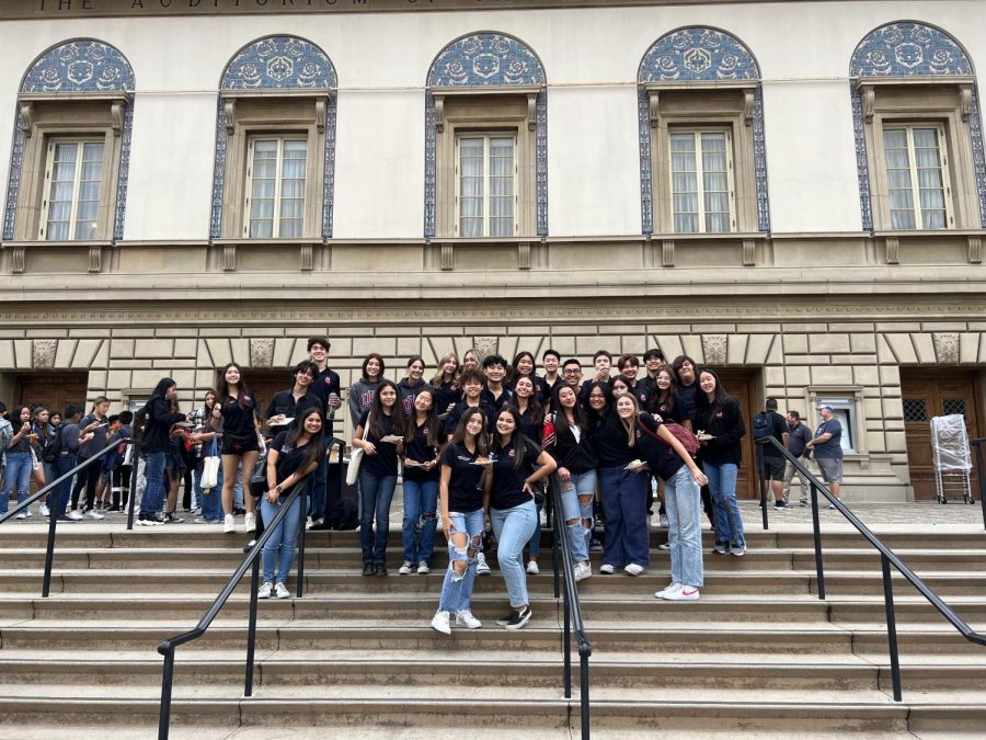 The USB family takes a photo in front of the conference building in Pasadena. 