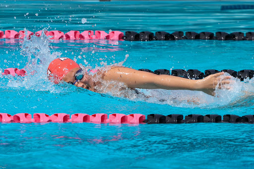 Anna Li (12) glides through the water during a competition