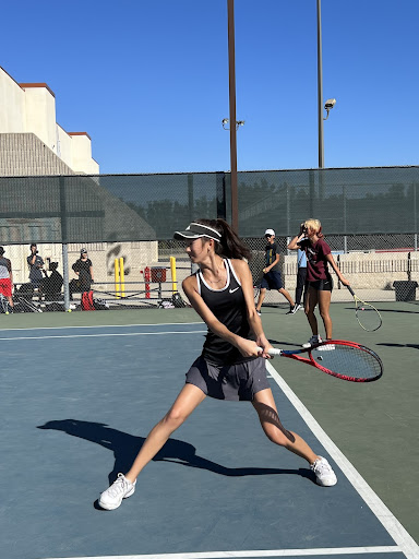 Captain Elaine Xu (12) strides towards her target