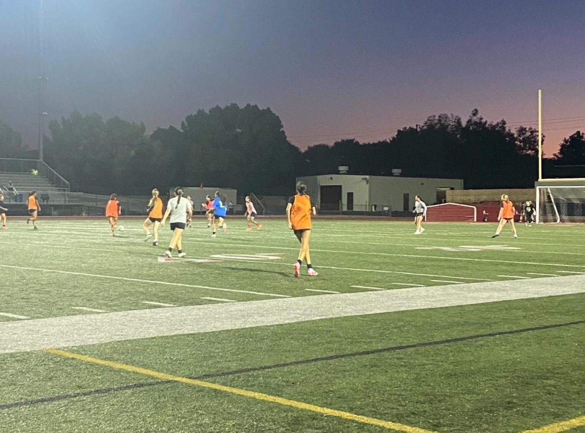On the last day of tryouts, girls’ are participating in a scrimmage for their last chance to prove themselves before the teams are selected and rosters are released. 
