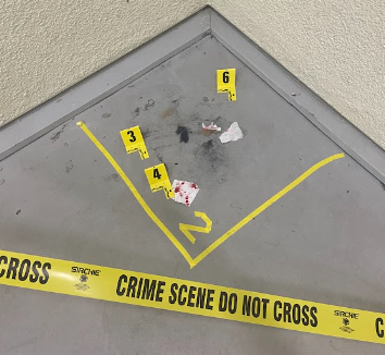 A crime scene was staged in the back staircase of the science building for students to solve. This is one of the many activities that students who participate in this club will be doing.  