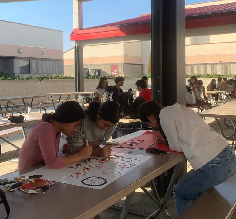 Members of the Project Lady Bulldogs Club, that advocates for female sports representation, are seen making posters as participants of the club. The Project Lady Bulldogs club supports all female representation in all aspects, allowing members to become more active and encouraging at school. 