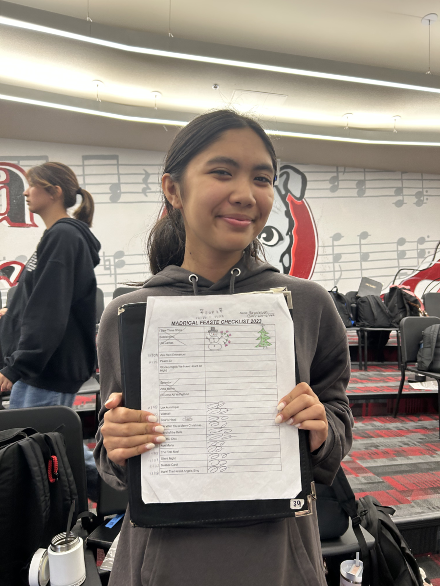 As Madrigal Feaste quickly approaches, Ayala Choir is practicing vigorously to create a memorable night for those in attendance. Seen in the picture, choir member Brooklyn Arteaga (10) flaunts her finished choir song checklist.