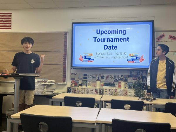 Presidents Ryan Chao (11) and Ninad Moholkar (11) inform the Speech and Debate club about details regarding their upcoming tournament, the first of many to come.