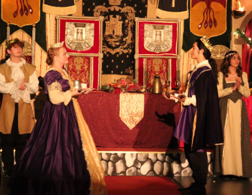 (From left) Abby Lane (12) and Nicholas “Nick” Tisnado-Palacios (12) are playing the King and Queen role in the 24th annual Madrigal Feaste. In the event otherwise know as “Mad Feaste, choir participants perform a set of songs during the two and a half hour show while the audience eats a three course meal. “My favorite part of the performance is getting to see the audiences reactions to everything because its a very unique experience,” women’s vocal ensemble member Lily Schaumann (11) said.