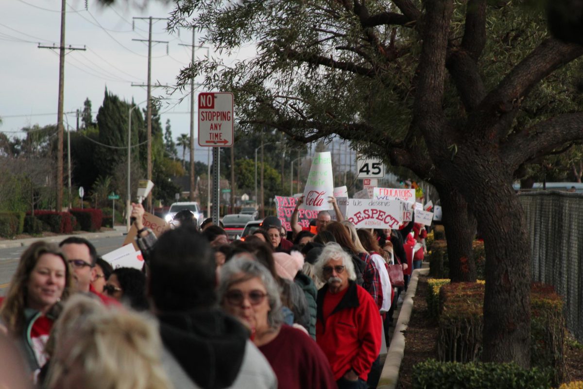 Several+hundreds+of+teachers+crowded+the+streets+in+front+of+Kimball+Park+and+Woodcrest+Junior+High+for+what+ended+up+being+a+very+memorable+meeting+in+the+progressions+of+teacher-district+negotiations.+Cars+honked+in+support%2C+and+whistles+blew+in+return.