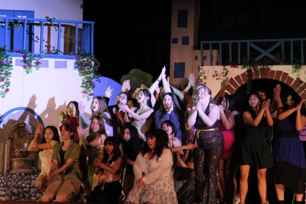 Mamma Mia!s main cast and ensemble cast come together to perform a large number, featuring Janelle Ann Medina (11) as Sophie Sheridan front and center. 