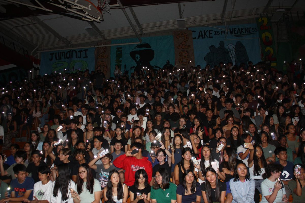 As class competitions rounded the corner, the freshmen side of the gym were seen lighting their phone flashlights in unison.