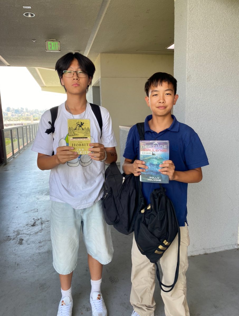 Friends Kyle Cheng (9) and Derek Chen (9) also have AIR books. Chen is reading a classic "The Hobbit" and diving into the literary works of J.R.R Tolkien. Cheng is reading "The Neptune Challenge."