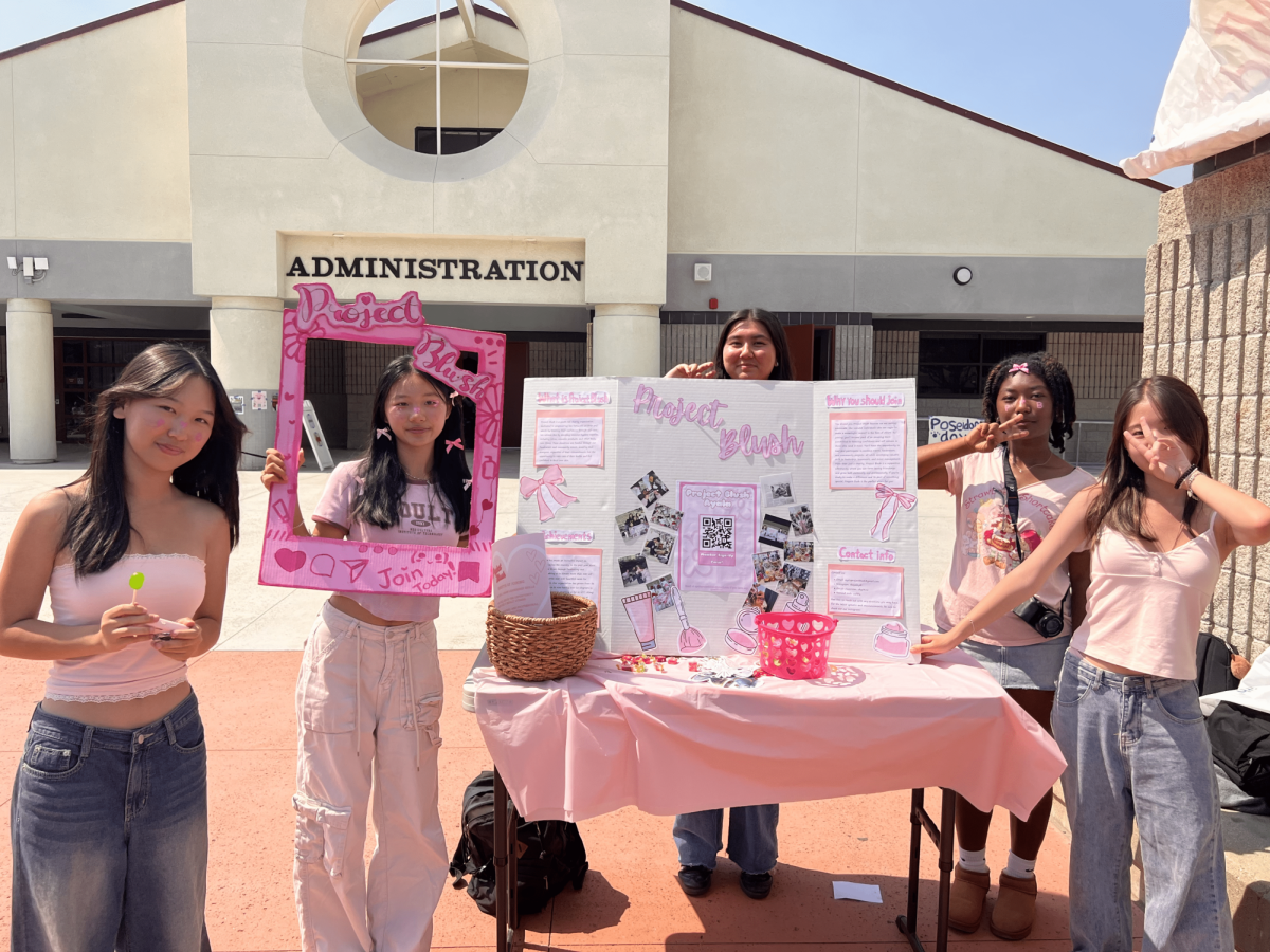 The members of Project Blush promote their cause with fun props and knick knacks during Club Rush on September 13.
Pictured left to right: Mia Chen (10), Lisa Chen (10), Jeree Apan (10), Aniya Grant (10), Emily Hsieh (10).