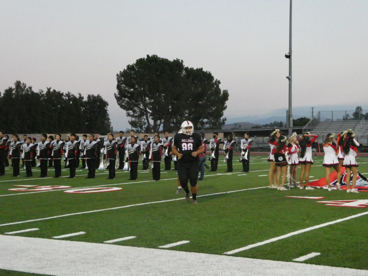 Ayala's Varsity football team makes a grand entrance to kick-start the homecoming game.  