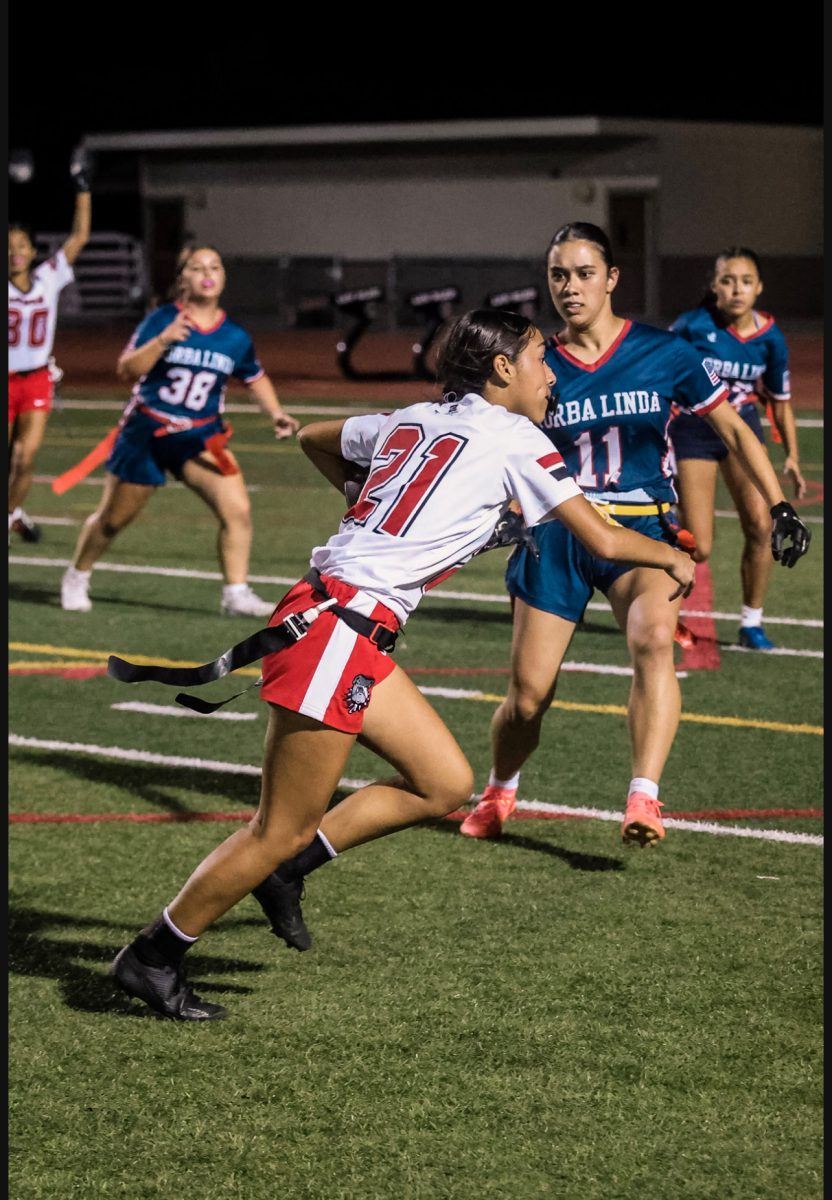 During their Yorba Linda game, Sarah Avila raced down the field to score a touchdown.