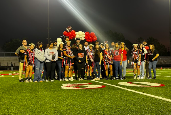 Varsity Flag football celebrates their seniors at their senior night game.