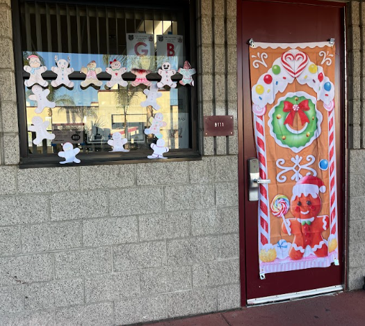 Teachers such as AP research teacher Mrs. Kimberly Barreras decorated their doors to bring holiday spirit to the "Deck the Quads" competition. 