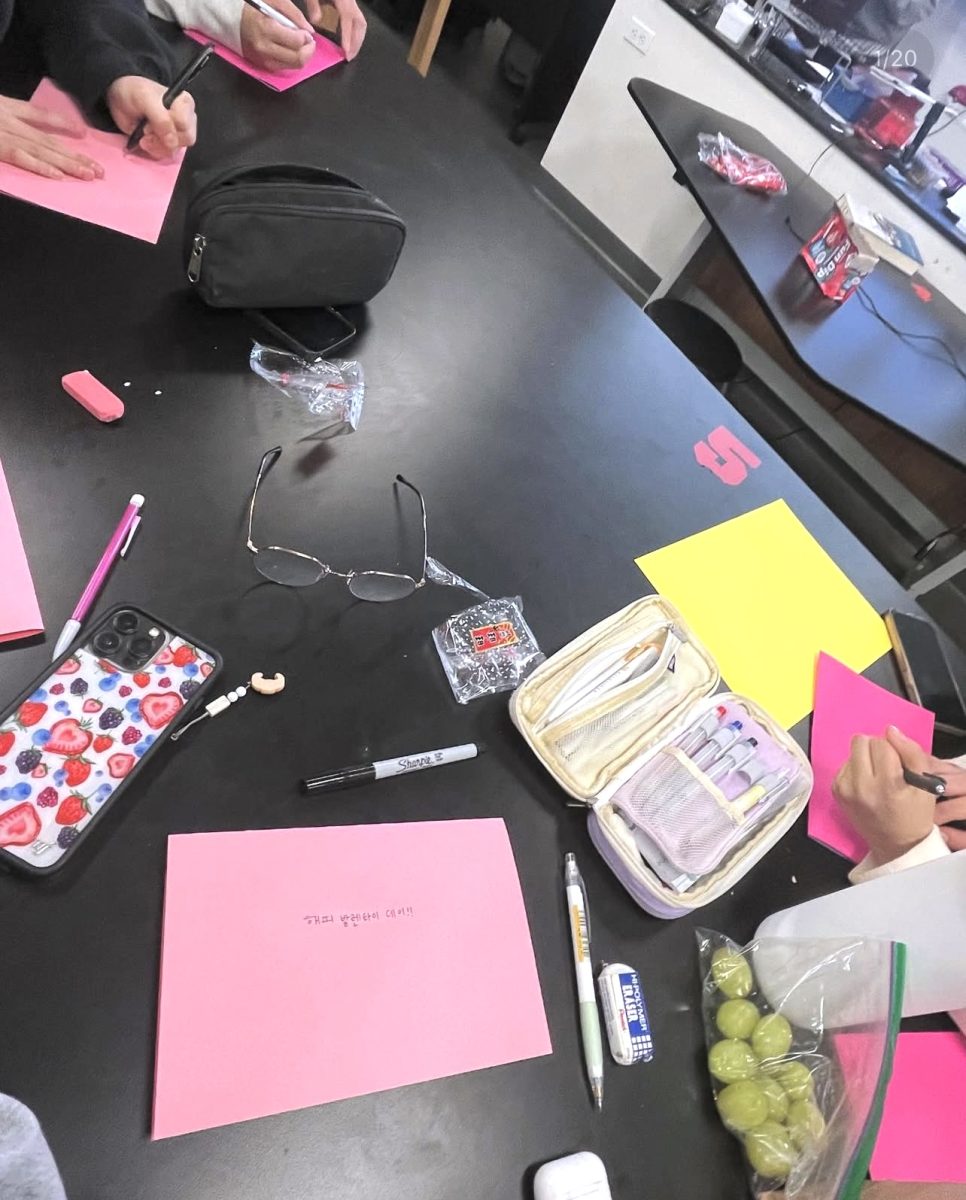 Students who attended the February meeting created cards with a Korean word, which was later given out to the elderly.
