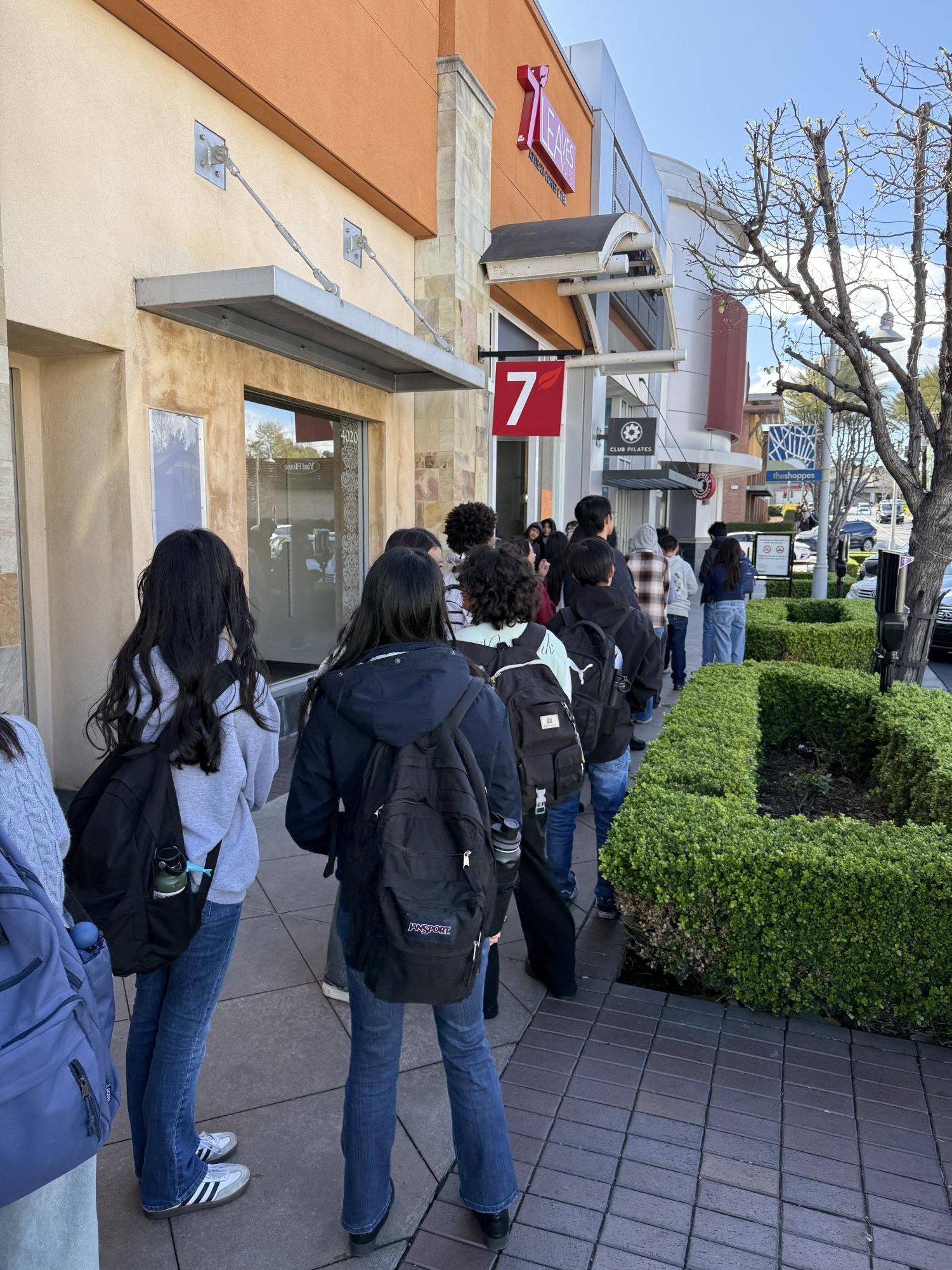 Students are lined up to get drinks for the CAASP fundraiser. The line was so long that you had to wait for hours to even get one drink. 