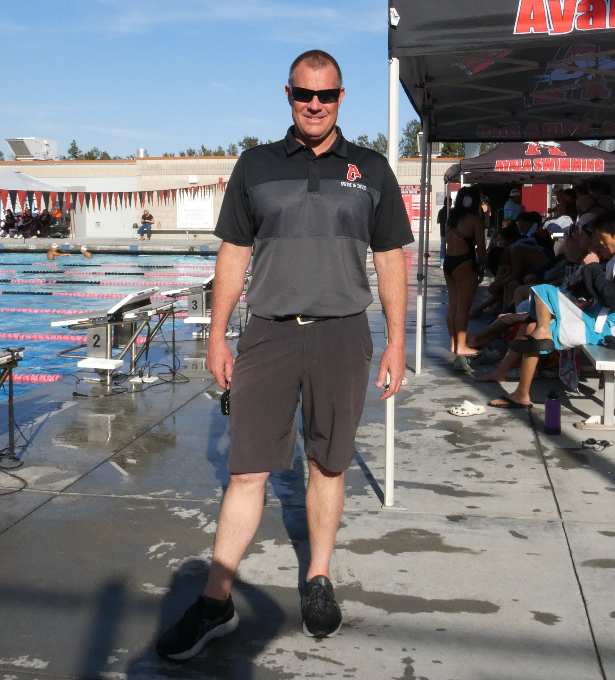 Head Coach Paul Marceau walks around giving advice to his swimmers at the home meet against Walnut. Through Coach Marceau's invaluable coaching, the athletes were able to put up an amazing game against the Mustangs.