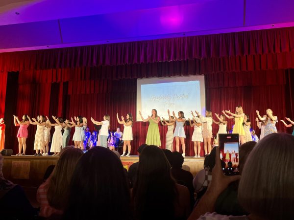 ASL 4 students perform the song "Hopelessly Devoted To You" by Olivia Newton-John during the emotion of sadness.