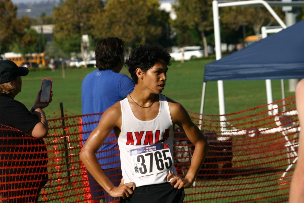 Byrson Caganap (10), after losing neck to neck in the Palomares League Preview, but accompanied with a new PR. "Even when you lose, you win," Caganap said. 