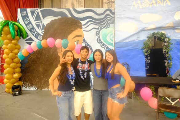 From left, the 2028 class officers 
Madelynn Tsai, Preston Tukay, Emily Min, and Makayla Kiddoo pose for a photo at the very first rally of the school year.