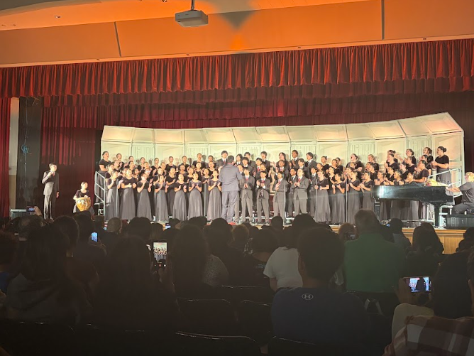Ayala's choirs came together to sing the final song of the choir concert, "Inkosi Namandla" by Michael Barrett. This song was meant to be a happy upbeat song to end the concert off on a high note. 