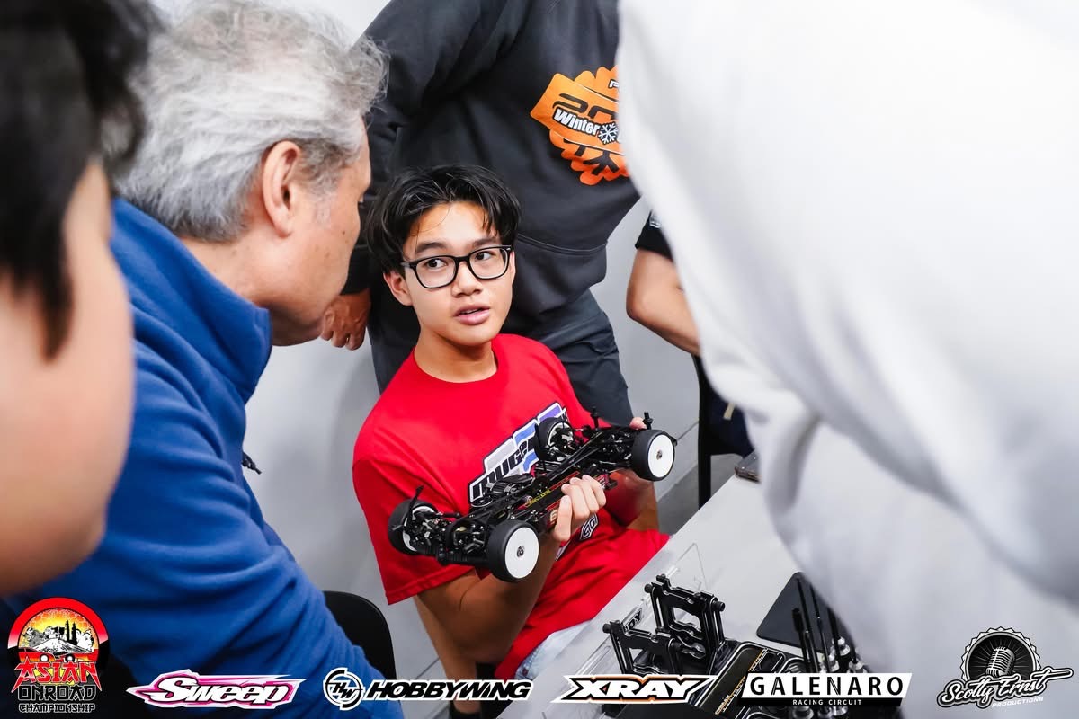Jacob Cruz (11), surrounded by many professionals, shows his knowledge of such cars and talks about how they can fix them to help reach their maximum potential.