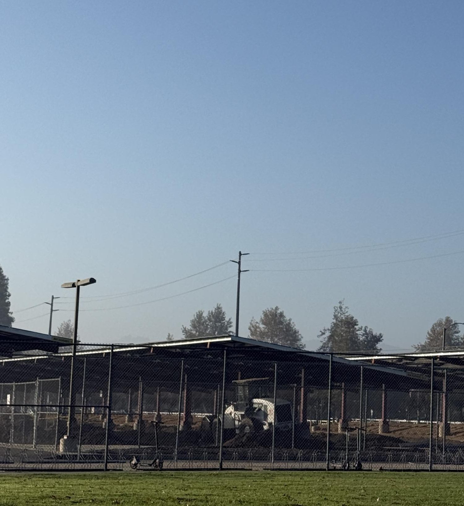 Asphalt resurfacing takes place in the senior parking lot, forcing students to park elsewhere.