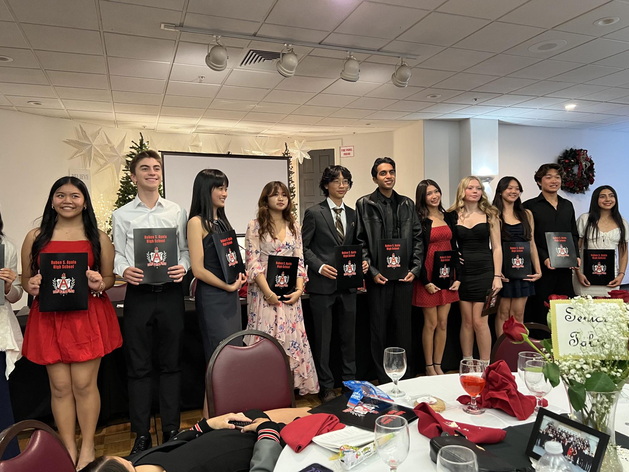 Juniors in the USB class stood together at the front of the banquet, receiving plaques that commemorate their dedication from the last semester. As the banquet says farewell to the seniors, the juniors step in as the role models in USB.