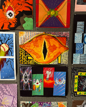 In the middle of the wall lies the Eye of Sauron, the infamous symbol from “Lord of the Rings.” As caricatures surround the famous picture, the Eye of Sauron continues to be the center of attention.