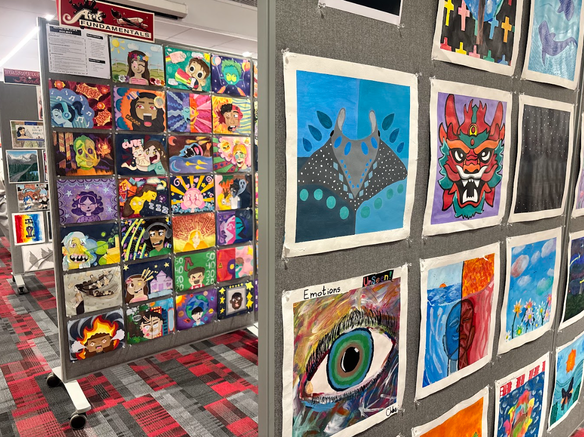Rows of carefully crafted artistic expression fill the library, proudly displaying the unique work created by students.