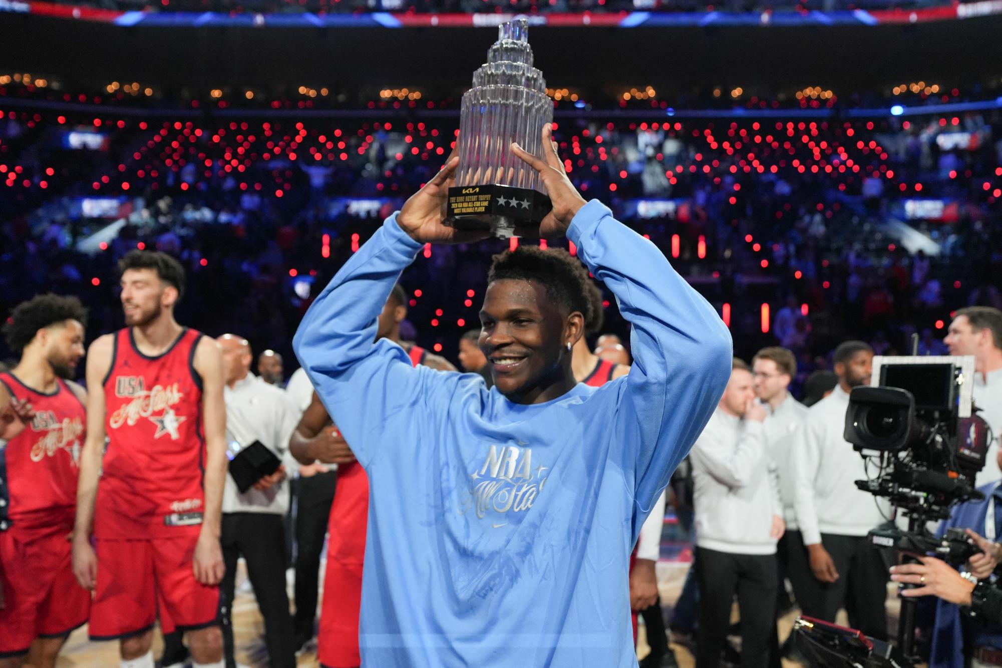 Team USA Stars guard Anthony Edwards (5) of the Minnesota Timberwolves poses with the MVP trophy after the 75th NBA All Star Game at Intuit Dome. 