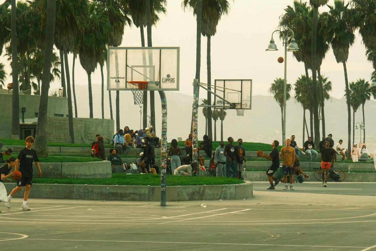 The public courts of Venice Beach are often packed with people playing pickup basketball.