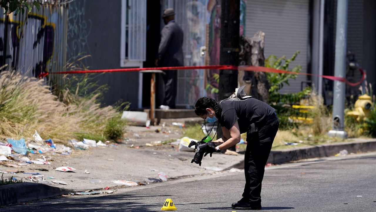 Patty Navanjo, a crime scene photographer, was a guest speaker at the ELAJEA Contest. Laila Kumar (11) won first place on this article of Navanjo.