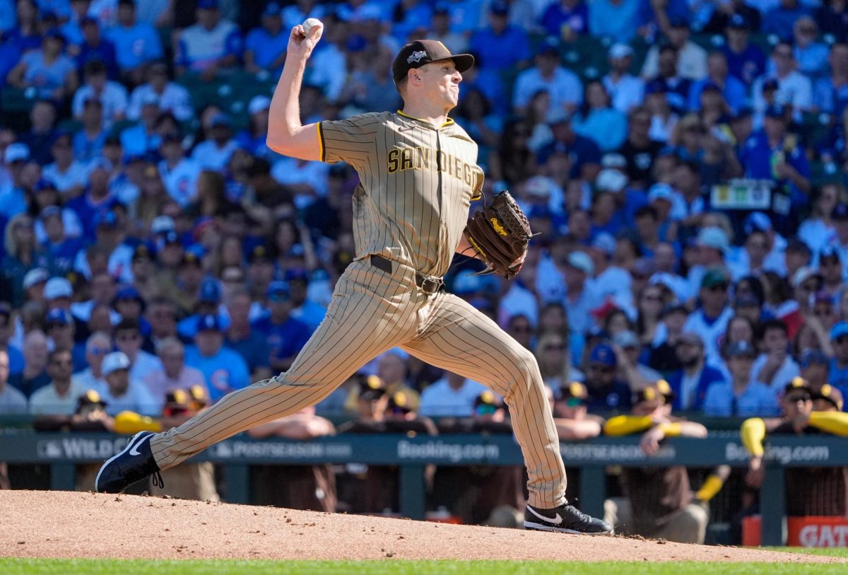 San Diego Padres starting pitcher Nick Pivetta (27) delivers a pitch against the Chicago Cubs in the first inning during game one of the Wildcard round for the 2025 MLB playoffs at Wrigley Field. 