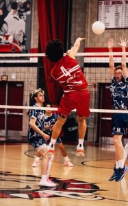Aiden Coronel (12) spiking the ball against opponents. Coronel plans to Rome City Institute, where he will continue his volleyball career.