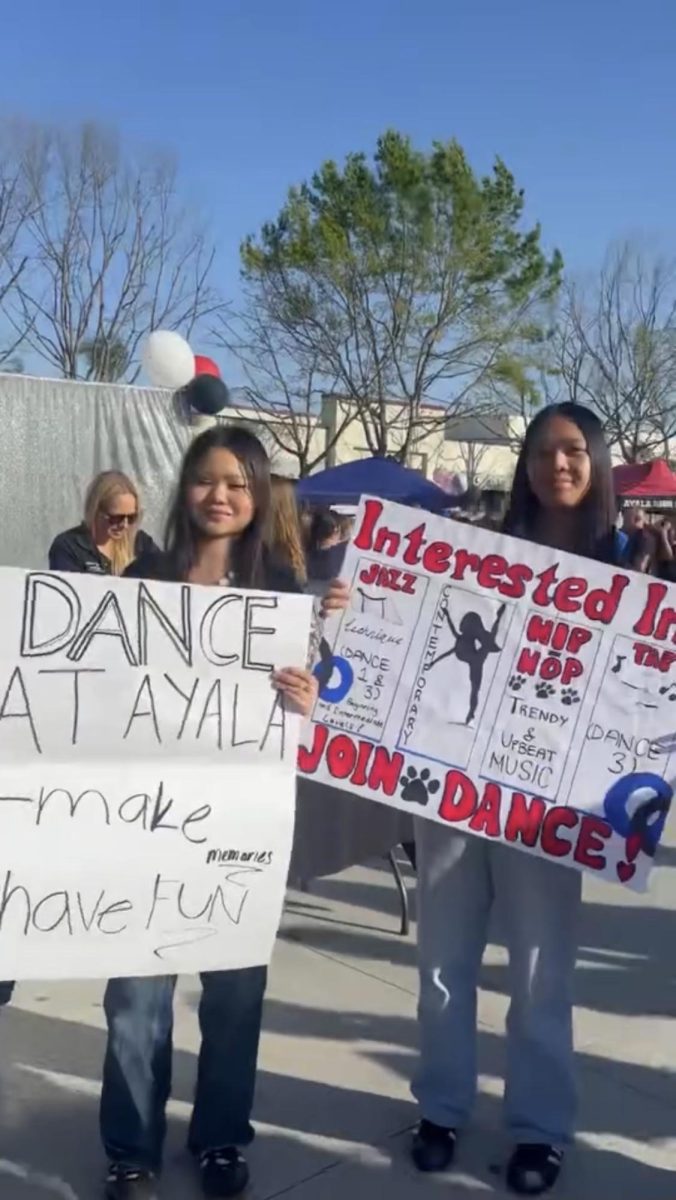 Both Vivian Pham (10) and Nikki Sivixay (10) stand together trying to encourage students at Eighth Grade Night to join Ayala's Dance Program. This was an amazing night for both them and everyone who attend the wonderful event. 