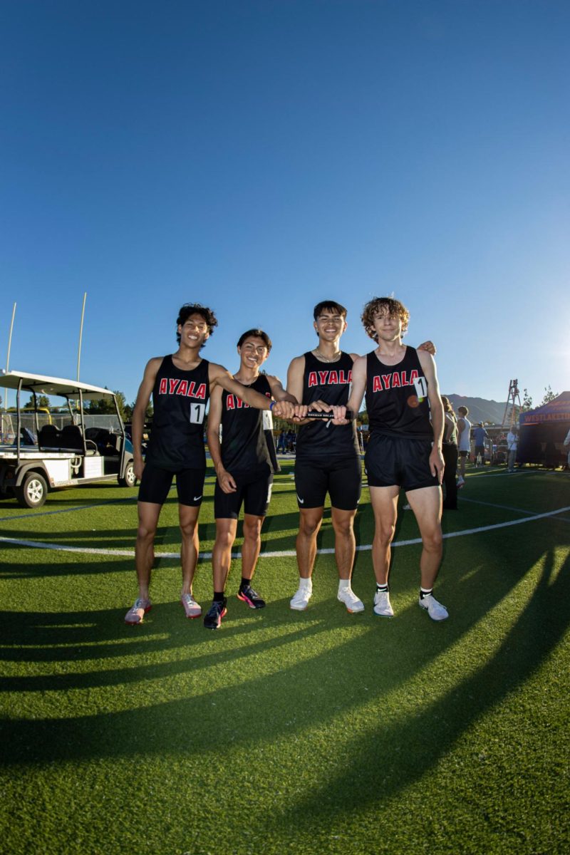 From left, Bryson Cagnap (10), Jack Paz (10), Zachary Paz (11), and David Wilson (11) at the Tara Davis meet  where they each raced individually, as well as in their relay team.