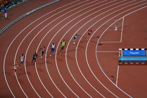 Usain Bolt sprints to the finish line.