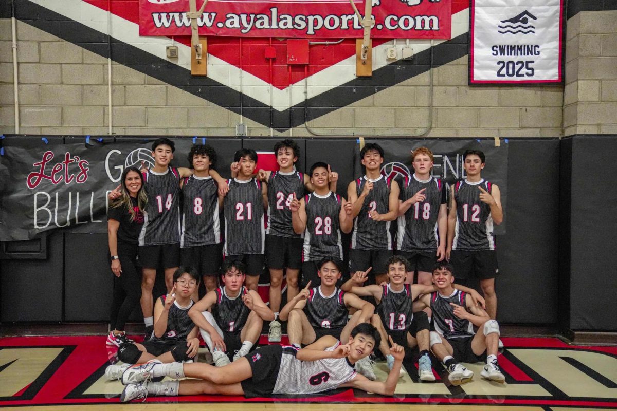 The boys volleyball team celebrate following their victory in CIF playoffs.